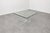 A striking 1990s square dining table attributed to Jeffrey Bigelow, featuring a substantial three-quarter-inch thick...