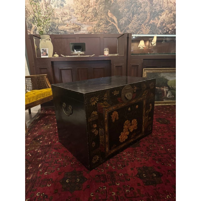 A classic 19th century Chinese wedding trunk, dating to circa 1880 and finished in rich black lacquer with beautifully...