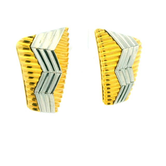 A bold and unmistakably sculptural pair of platinum and 18K yellow gold earrings from the iconic “Heatwave” collection by...