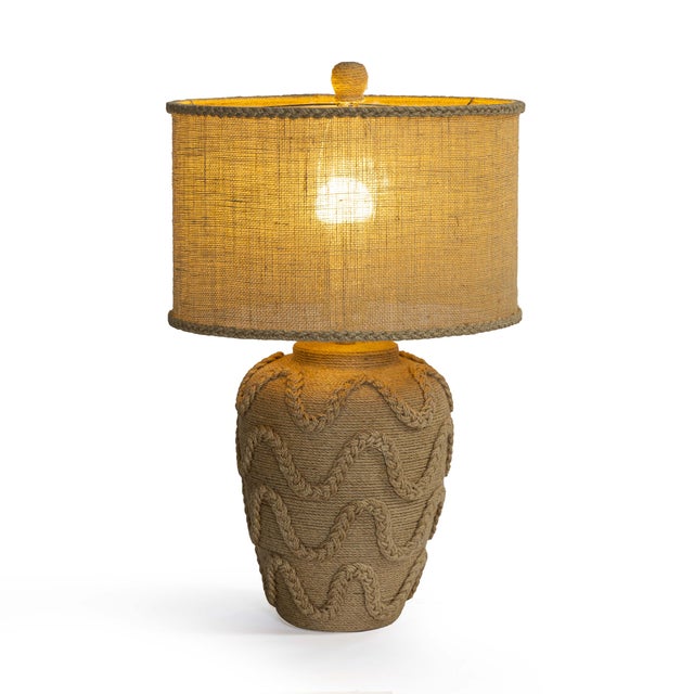 The Baha Natural Bamboo Jute Table Lamp brings an easy, laid-back warmth to your space. Made from natural bamboo jute...
