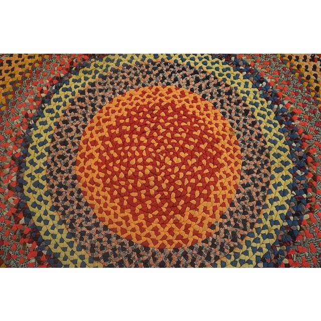 American 1930s Multi Background Wtih Folk Art Styles Round Antique American Braided Rug For Sale - Image 3 of 15