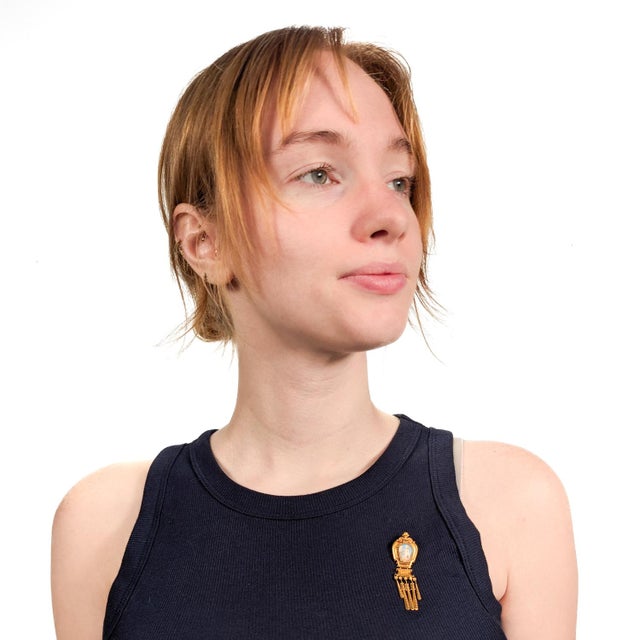 A fine antique brooch. In high karat gold. In the style of Eugene Fontenay. Bezel-set with an extremely finely painted...