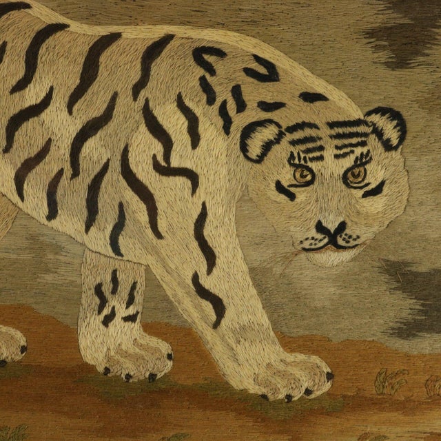 Victorian Woolwork Embroidered Picture of a Tiger. The embroidery is worked in wool on canvas ground, in a variety of...
