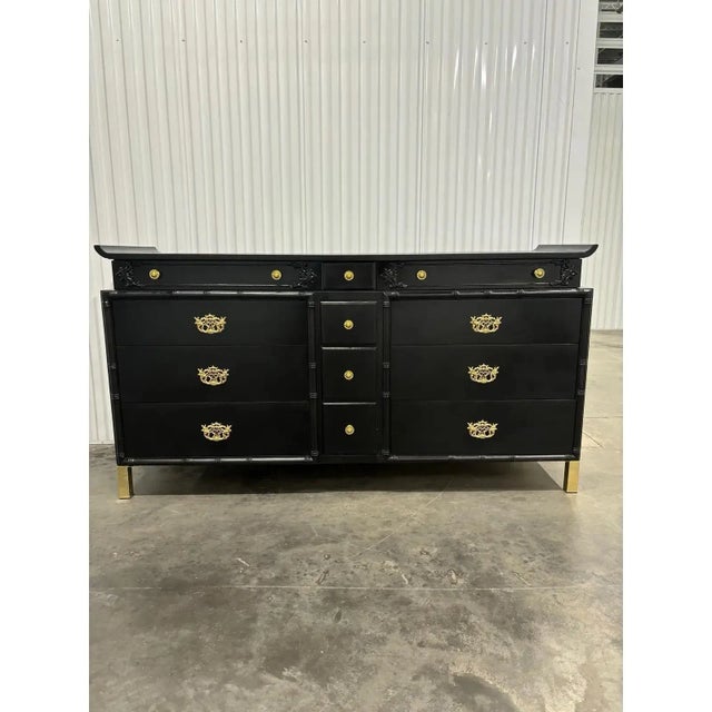 Offered is a vintage heavy, solid walnut chinoiserie style dresser. This piece features gorgeous chinoiserie brass pulls,...