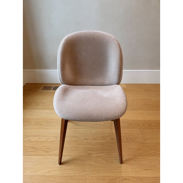 Stunning set of 10 custom GUBI Beetle Dining Chairs, upholstered in luxurious camel mohair and finished with warm walnut...