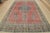 An authentic vintage traditional Tabriz rug hand-knotted with an all-wool pile on a cotton foundation. This oriental rug...