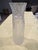 This elegant crystal vase features a raised daffodil design with pinched top and clear/frosted finish. It is signed...