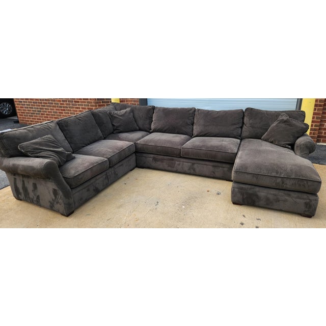 Four-piece sectional sofa attributed to Arhaus upholstered in a distinctive forest green corduroy fabric, combining...