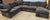 Four-piece sectional sofa attributed to Arhaus upholstered in a distinctive forest green corduroy fabric, combining...