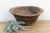There is something deeply grounding about holding a vessel that was hewn by hand from a single block of wood. This antique...