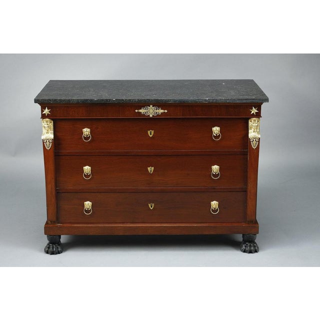 A mahogany and mahogany veneer bedroom set from the consulat retour d'egypte period (circa: 1795) comprising : - a...