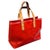This striking Louis Vuitton Reade hand-bag is a vibrant statement piece crafted from the house's iconic Monogram Vernis...