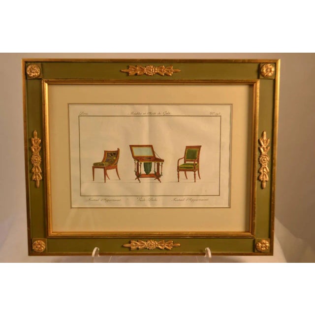 Framed handcolored engraving of interior design sketches. Matted and framed in gold-leaf and olive green, with corner...