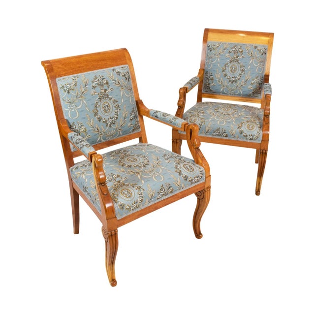 A pair of Empire / Biedermeier plum wood from circa 1815, newly upholstered with new fabric in classicist style. The...