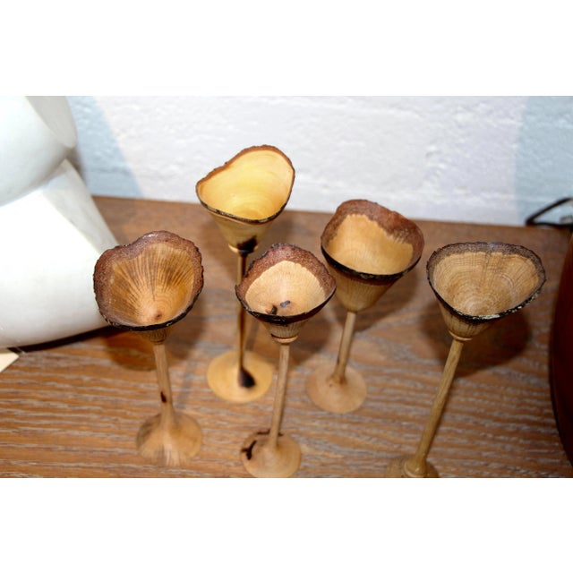An exquisite set of six cups hand-turned by the noted northern California wood worker Paul Maurer. The tallest cup is...