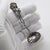 This Italian silver mini ladle is an elegant and functional specialty utensil, meticulously handmade with an artistic...