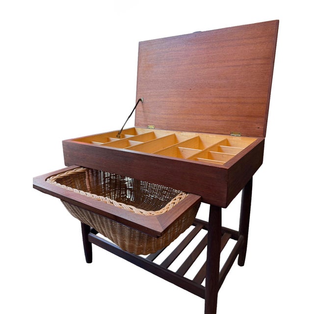 Designed by Danish designer Ejvind A. Johansson and produced by Vitré in Denmark during the 1960s. Crafted in teak with a...