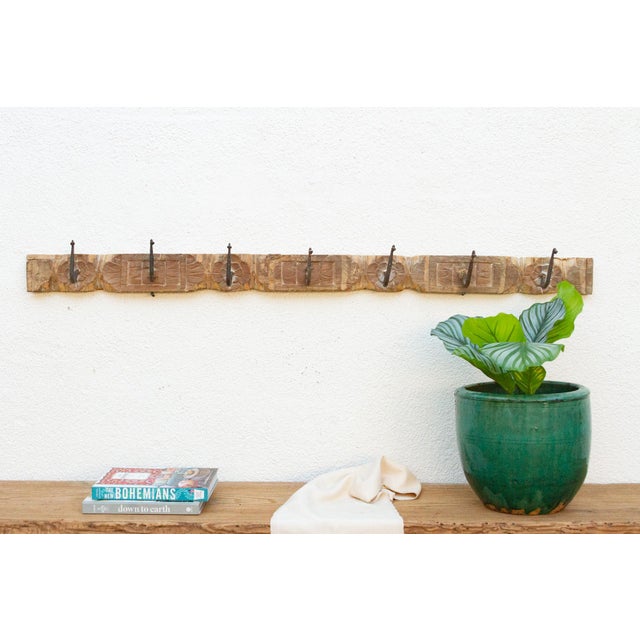 Add a touch of rustic charm to your home with this unique wall hook. Crafted from an antique southern Indian door lintel,...