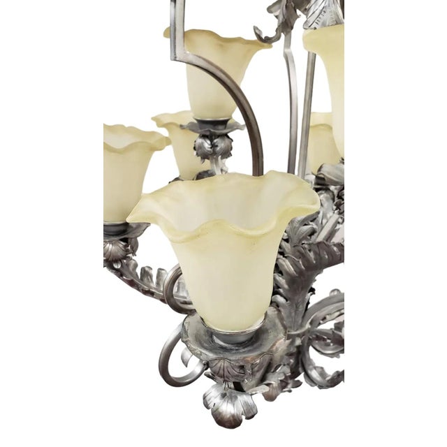 Capturing the striking transitional elegance between the organic fluidity of Art Nouveau and the structured luxury of...
