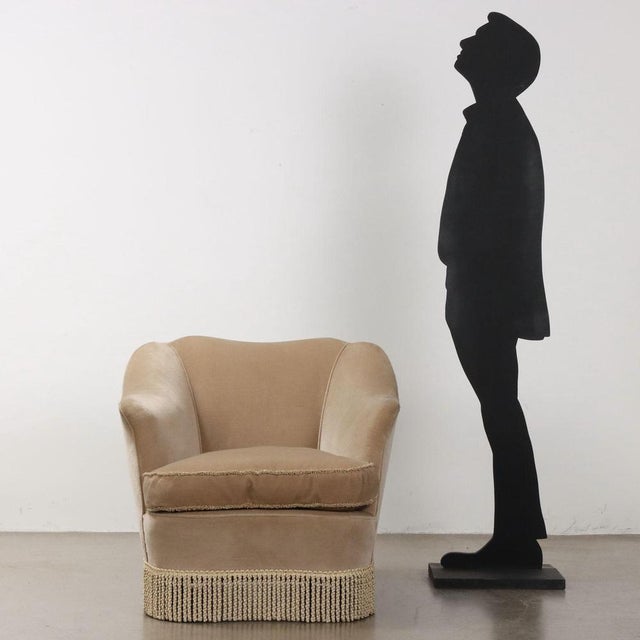 Vintage armchairs with foam and feather padding, velvet upholstery from the period in good condition. This piece is...