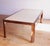 Extremely rare and beautiful 1970s Vladimir Kagan dining table featuring exotic zebrawood, aluminum inlay, and a cream...