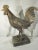A large wood carved paper mache mold in the shape of a rooster. It is rare in the sense that it is large scale and also a...