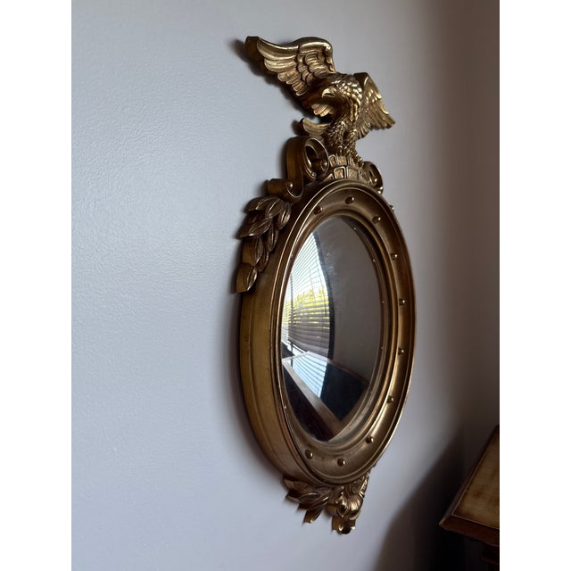 American heritage in the bald eagle gold mirror that is made to make your home feel patriotic and timeless American...