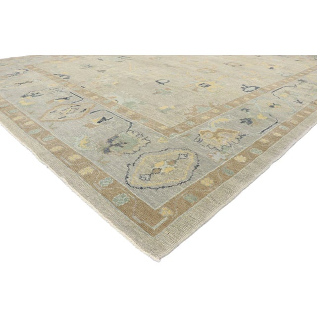 Turkish Oushak Rug with Modern Transitional Style 10'01 x 13'10. Blending elements from the modern world with soft colors,...
