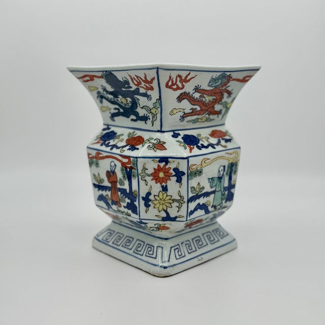 This is an impressive vintage Chinese porcelain zun vase, expertly crafted in the rare octagonal form and lavishly...