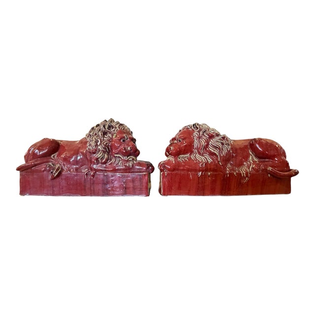 Pair Oxblood Glaze Art Deco Lions For Sale