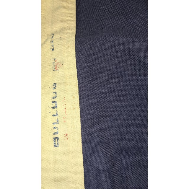 A striking vintage American flag featuring the historic 13-star circular configuration associated with the original...