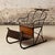 Add a unique and nostalgic touch to your space with this 19th century French iron sled with oak seat, a charming piece...