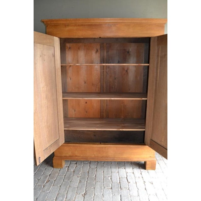 of a 19th-century French oak cabinet. The height is 203 cm. The width is 153 cm. The depth is 61 cm. Fully removable....