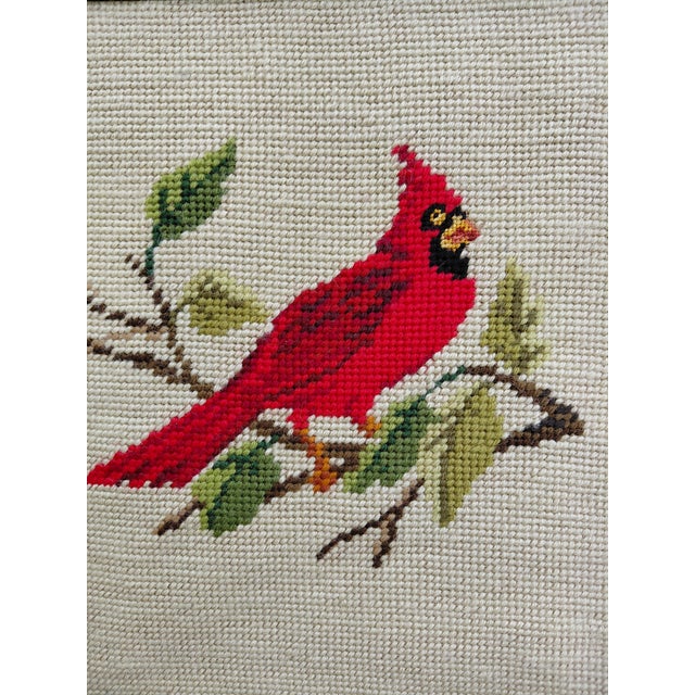 This vintage framed needlepoint picture features a vibrant red cardinal bird. The needlepoint background is kind of a...