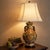 Vintage Tuscan-style ceramic table lamp featuring raised fruit and vine decoration with grape clusters and pomegranate...