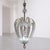 Elegant Murano glass chandelier attributed to Tomaso Buzzi for Venini, Italy, 1930s. The design is centered around a...