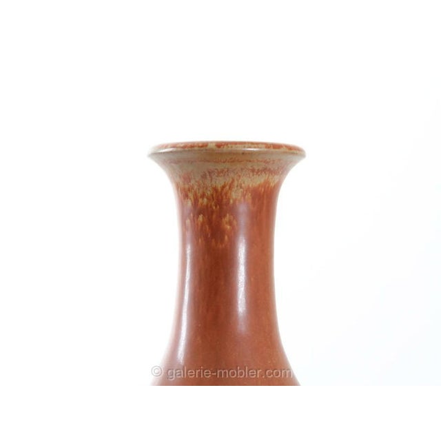 Vintage Scandinavian Orange Ceramic Vase by Gunnar Nylund for Rörstrand, in Very Good conditions. This piece is attributed...