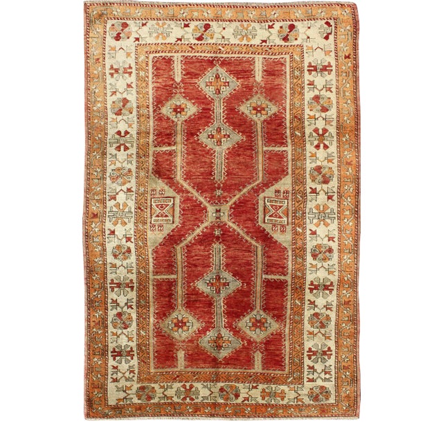 Antique Turkish Oushak Rug With Geometric Design in Red, Light Green, Orange and Cream For Sale