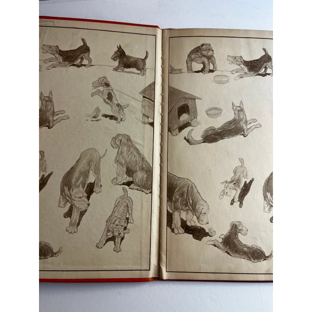 Absolutely charming antique book on dogs, titled Dogs, by Julius King. Hardcover with tipped in image on cover, and...