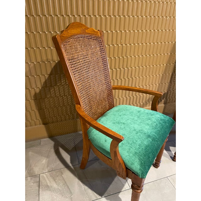 A striking pair of custom-upholstered vintage cane back armchairs, beautifully reimagined in Everfast Billiard Green...