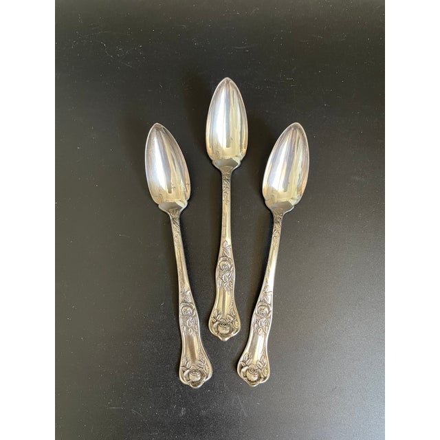 Lot of three 6" fruit/orange spoons in the Rosalie pattern by Royal Plate Co.(International Silver) The design features...