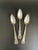 Lot of three 6" fruit/orange spoons in the Rosalie pattern by Royal Plate Co.(International Silver) The design features...