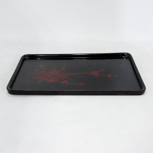 This elegant vintage rectangular serving tray is crafted in a classic Chinese lacquerware style, featuring a deep, high-...