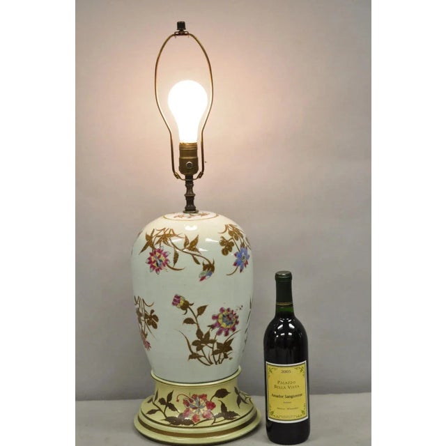 Vintage Oriental Chinese Porcelain Bulbous Jardinière Vase Floral Table Lamp on Painted Wood Base. Circa Mid 20th Century....
