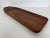 Rare vintage Danish serving tray with a beautifully sculpted form and single handle made from solid teak for Bonniers NYC....