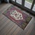 Welcome a touch of Anatolian charm into your home with this exquisite handcrafted small vintage rug. Its versatile size...