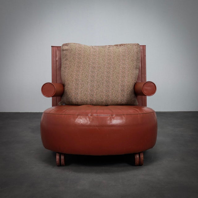 The baisity lounge chair, designed by antonio citterio for b&b italia in 1986, reflects the refined balance between...