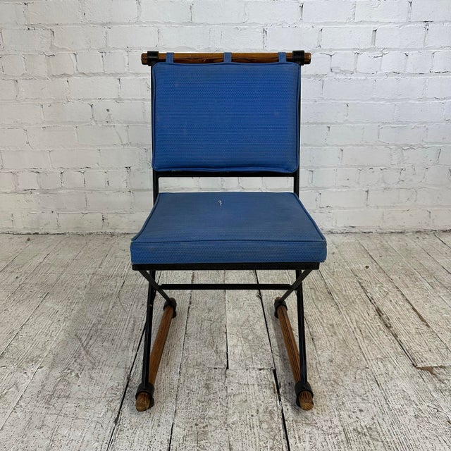 Mid-century modern side chair Attributed to Cleo Baldon with a wrought iron base and oak accents.