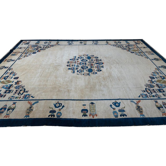 1920 Chinese Peking Rug 7' 5"x9' 11" This antique Chinese Peking rug is a circa-1920, hand-knotted wool piece measuring 7'...