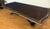 This is the Grand Traditions Dining Table by Maitland - Smith. It features a mahogany top with a field of beautifully...